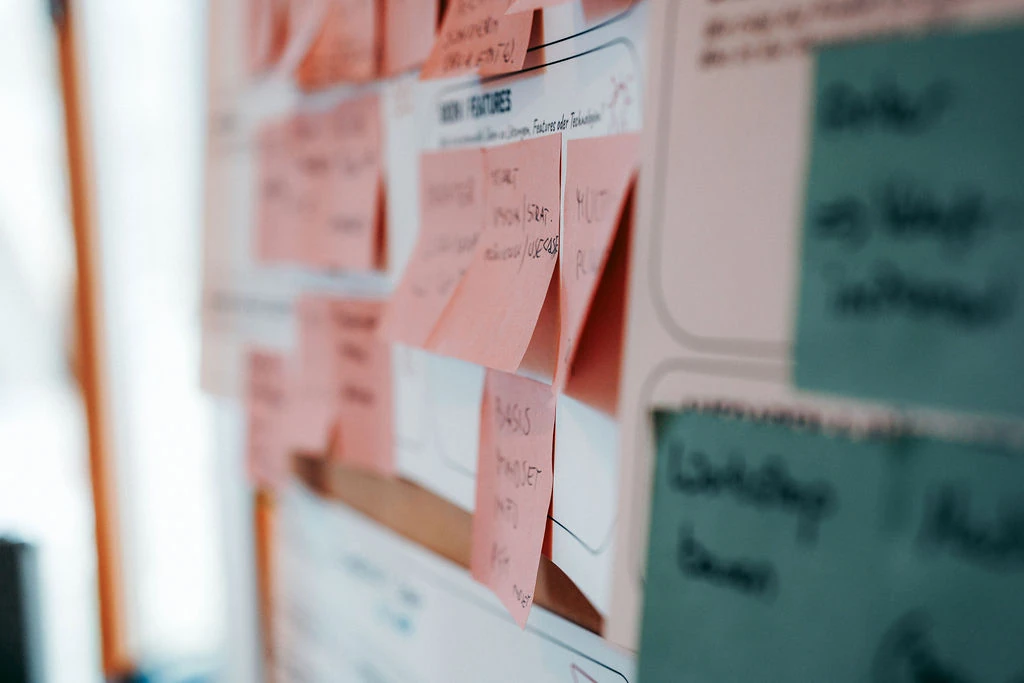 Board of action cards from the change process, close up